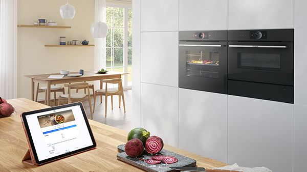 Light and open kitchen with multiple Bosch appliances