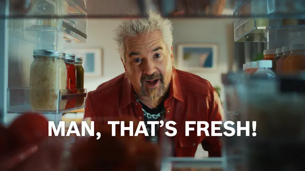 Guy Fieri with fridge open saying 'Man, That's Fresh!'