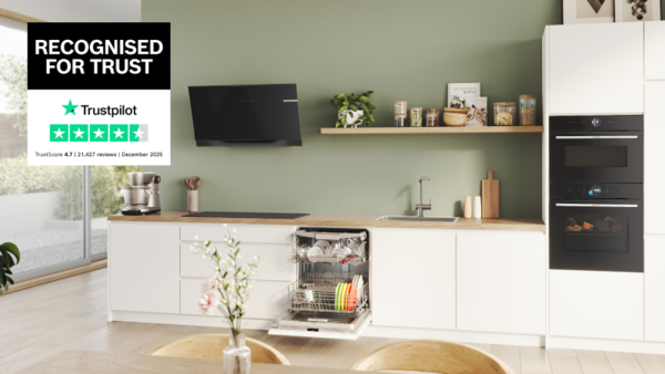 Bright open kitchen with multiple Bosch appliances and Recognised For Trust reviews icon overlay