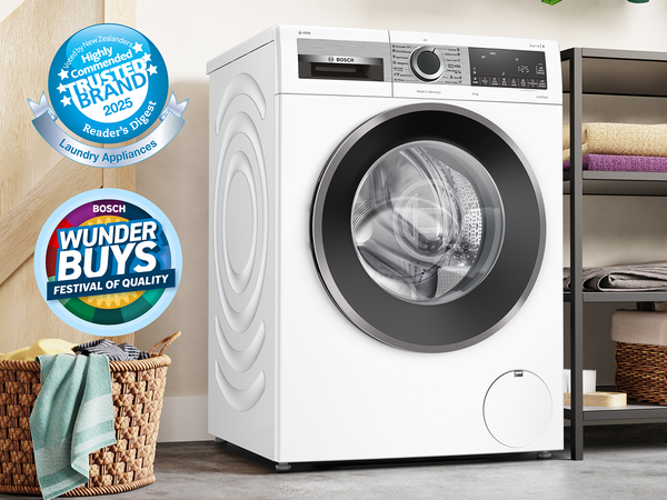 White Bosch front-load washing machine in laundry room 