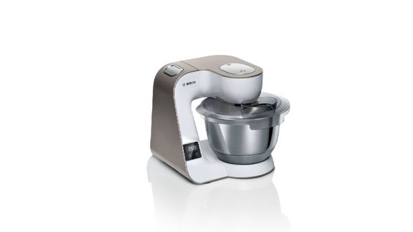 Stainless steel kitchen stand mixer with attachments, Bosch brand, modern design. 