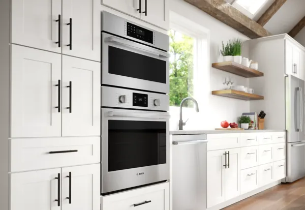 Bosch double oven with white kitchen cabinets
