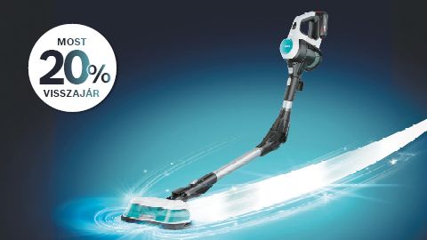 P&oacute;diumon &aacute;ll&oacute;, fel&uuml;lről megvil&aacute;g&iacute;tott Bosch MUM fekete &eacute;s ez&uuml;st konyhai robotg&eacute;p magenta sz&iacute;nű h&aacute;tt&eacute;ren 15%-os piktogrammal mellette