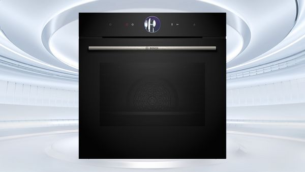 Schwarzer Bosch Einbaubackofen mit digitalem Display vor hellem, futuristischem Hintergrund.