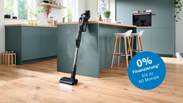 Bosch Akku-Staubsauger in Wohnzimmer mit Hinweis auf 60 Monate Finanzierung M&ouml;glichkeit