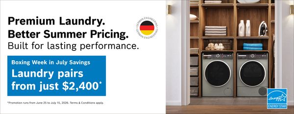 Modern laundry pair in wooden shelving with towels, detergent, and iron, promoting Boxing Week sale from $2,400 with Energy Star certification