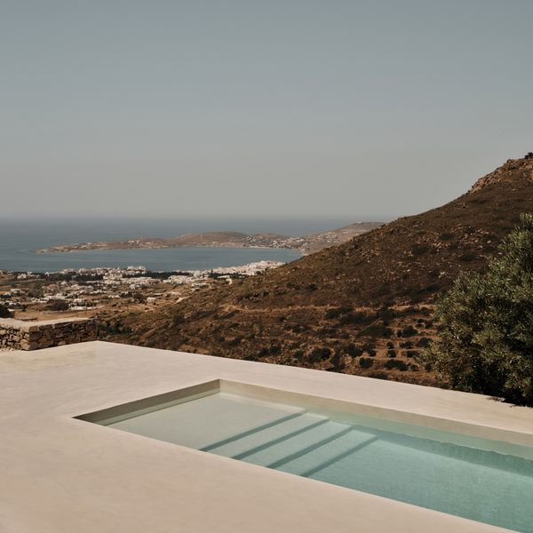 Exterior shot of the SR house showing the pool and view of the coastline 