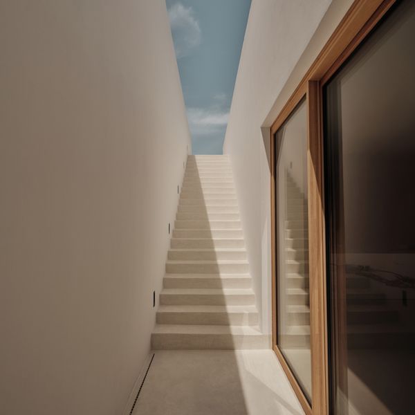Exterior shot of the SR house showing the stairs down to the embedded rooms 