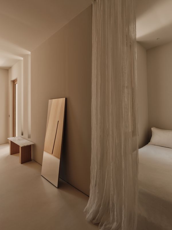 Interior shot of a corridor and bedroom in the SR house 