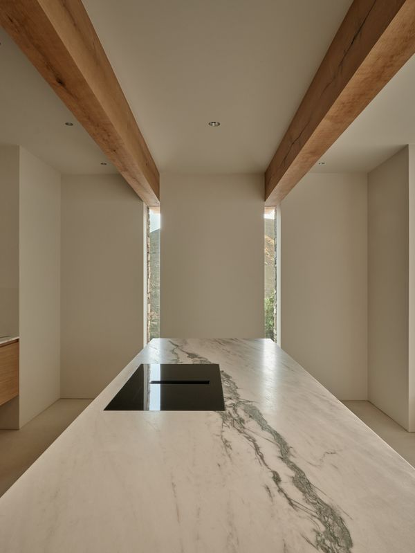 View across the marble worktop and the Gaggenau Induction cooktop with integrated ventilation 