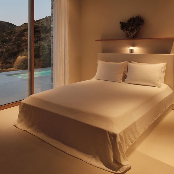 Interior shot of a bedroom taken during dusk in the SR house 
