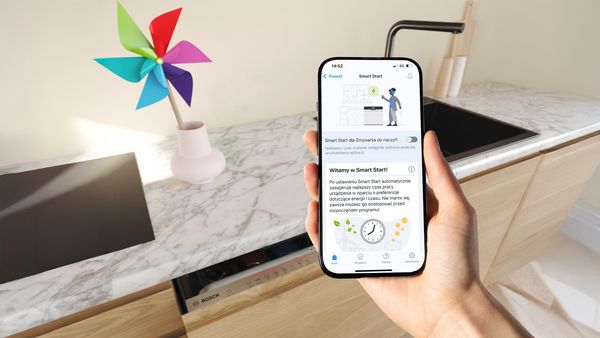 Zmywarka z telefonem i Smart Start na ekranie.