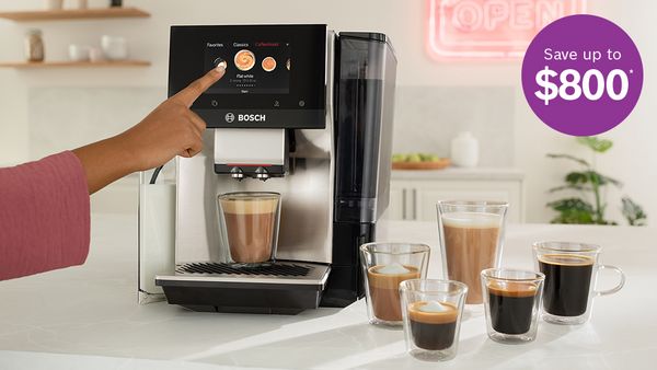 Bosch automatic espresso machine dispensing coffee, with multiple coffee drinks and a &ldquo;Save up to $800&rdquo; promotion.