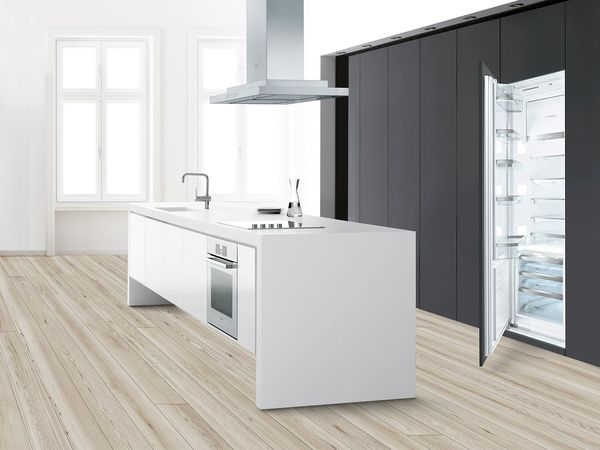 Bosch kitchen with integrated upright freezer with decor panel
