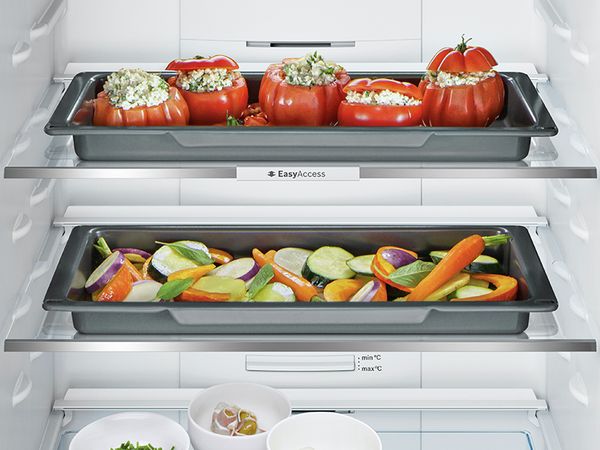 Perfect result of stuffed tomatoes and roasted vegetables recipe made with Bosch Serie 6 and 8 ovens.