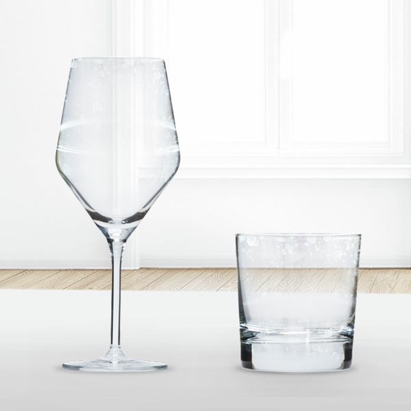 Water droplets left on different glasses