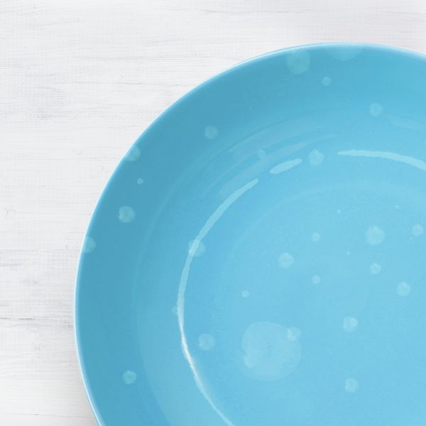 Lime scale marks on blue dish plate