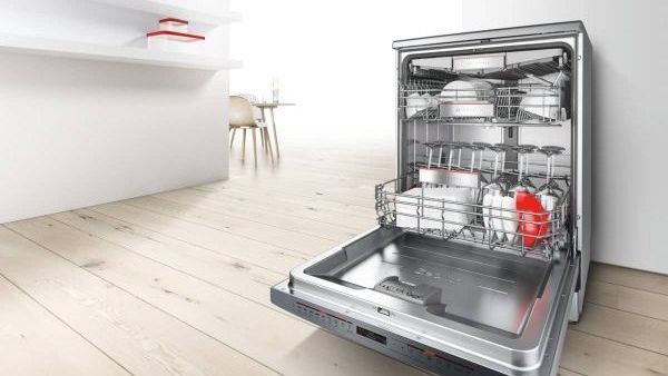 Modern open kitchen with Bosch appliances.