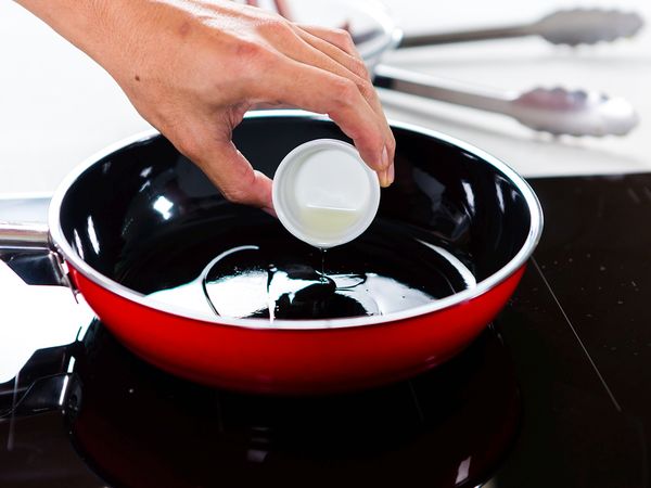 Pour cooking oil into a medium-heated pan