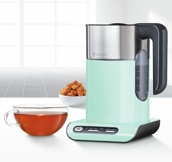 Bosch kettle with transparent cup of tea nearby