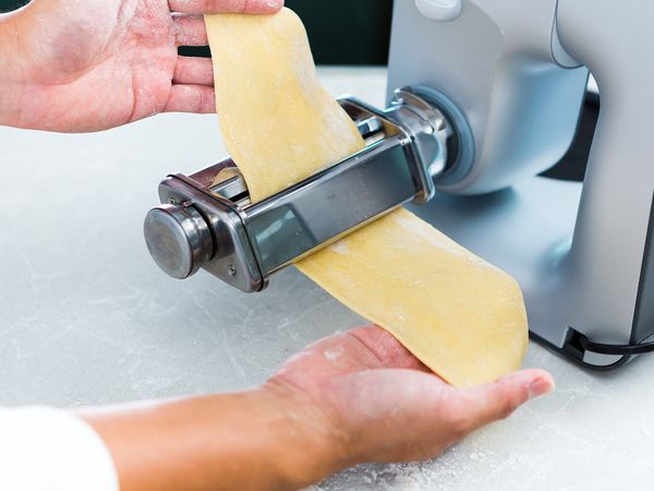 Roll out the dough into flat sheets
