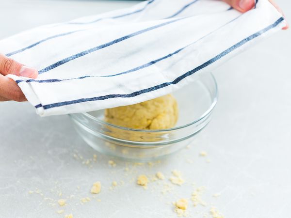 Cover the dough with a damp cloth