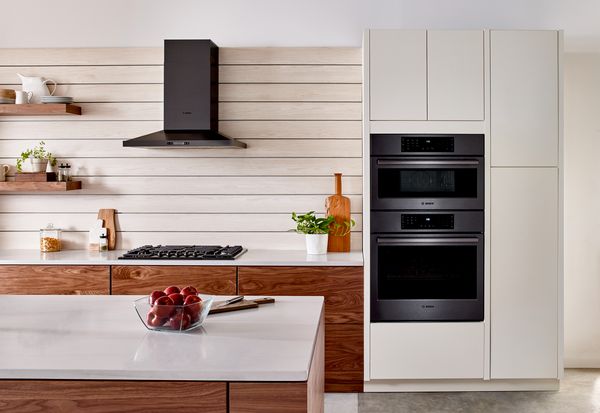 Kitchen featuring black stainless steel Bosch appliances