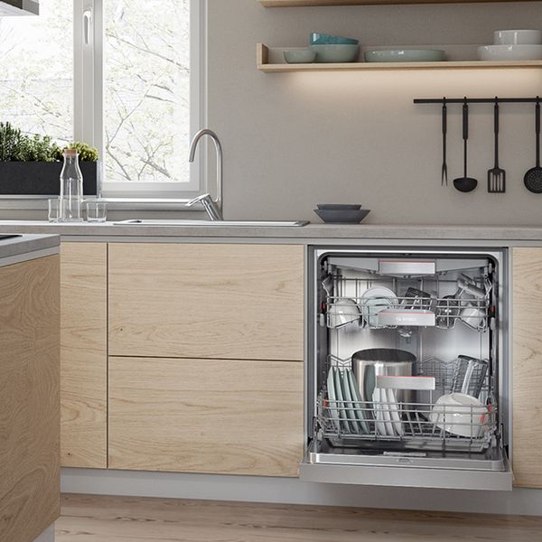 Inside a Bosch built-in dishwasher with a VarioFlexPlus dish rack system