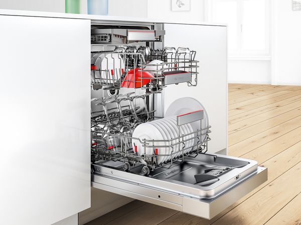 Open Bosch Dishwasher with clean & dry crockery in dishwasher