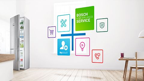 Négyszögekben levő színes Bosch háztartási készülék ikonok úsznak a levegőben egy modern ebédlőben.