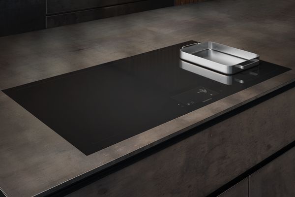Gaggenau 400 series full surface induction cooktop in a modern kitchen