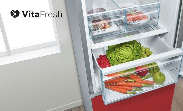 Bosch interior fridge with vitafresh trays with fresh produce.