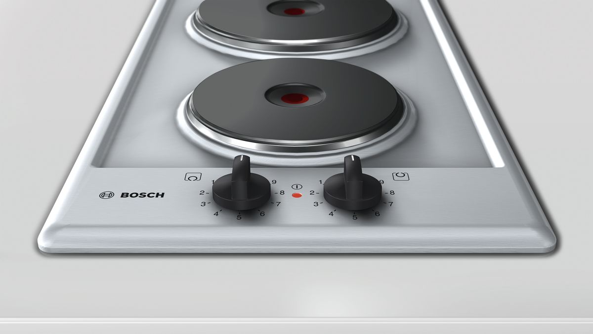 Serie | 2 Sealed plate cooktop Domino, brushed steel frame PCX345E0 PCX345E0-2