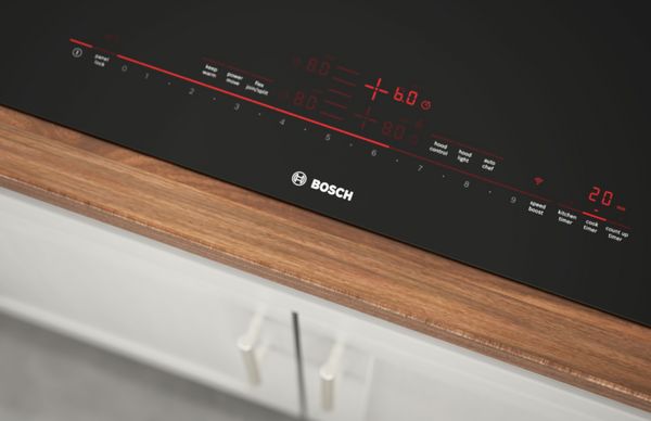 Induction cooktop showing the controls and bottom trim