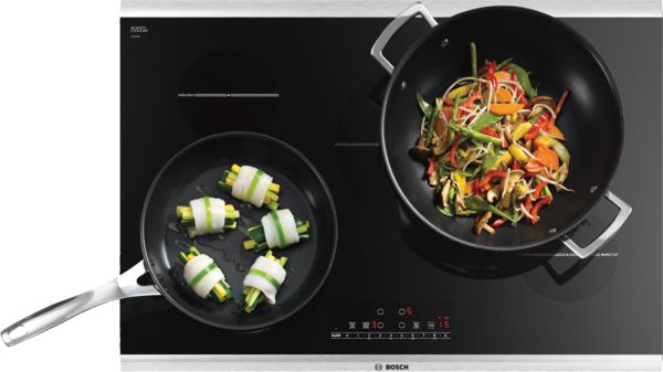 https://media3.bosch-home.com/Product_Shots/600x337/MCSA00777683_Bosch-Induction-Cooktop-NIT8066UC-TOP-Cooktop-With-Food-2_def.jpg